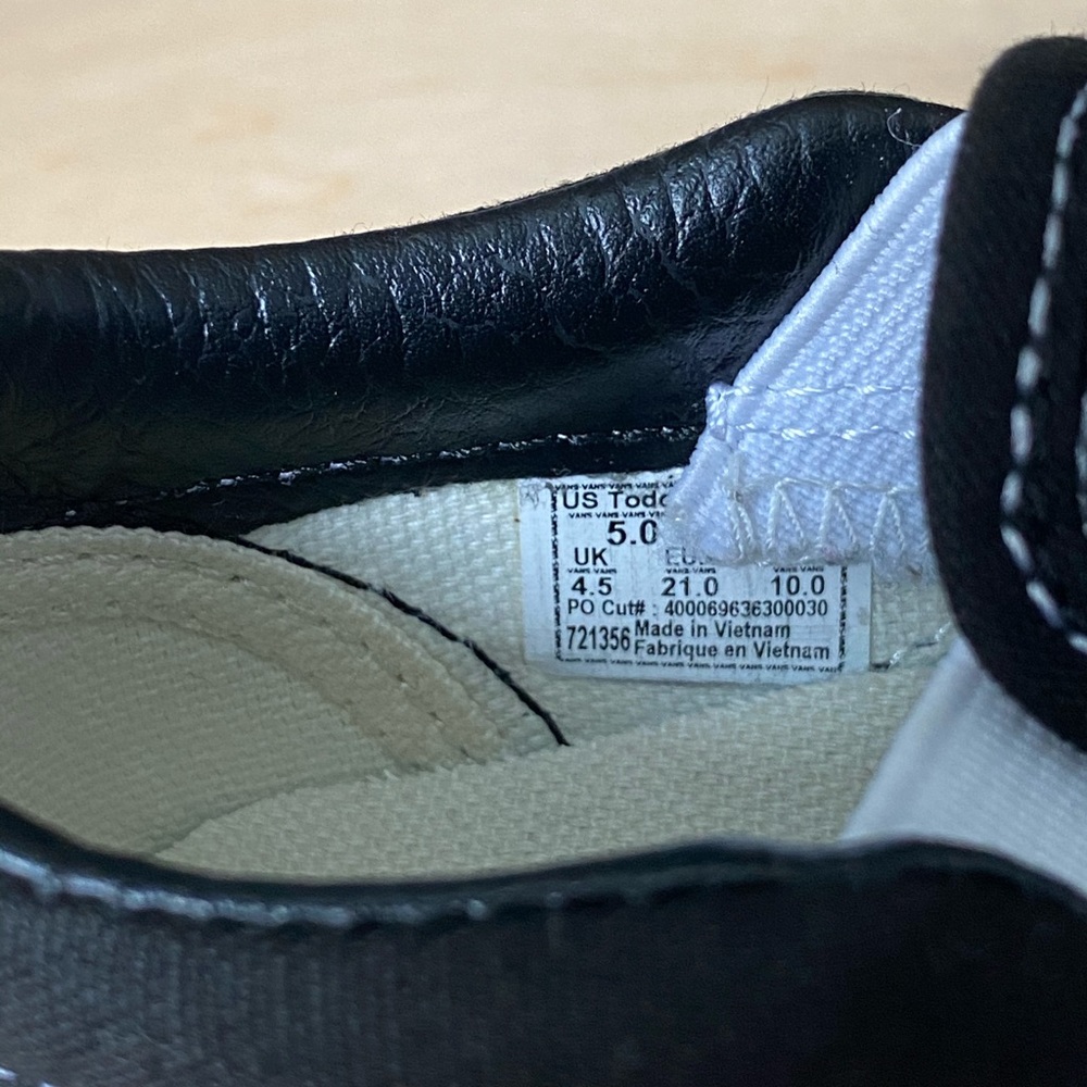 New slip on black and white vans size 5
